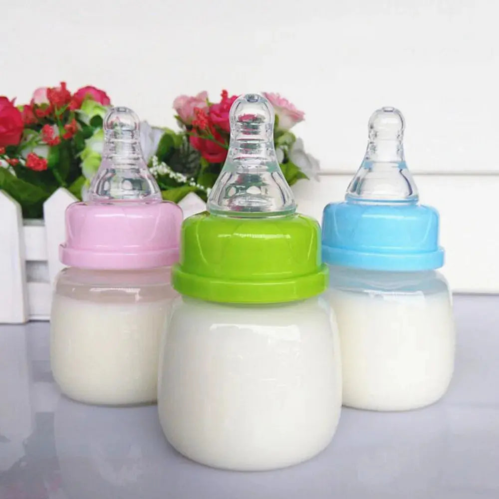 60ML Baby Newborn Mini Portable Feeding Nursing Bottle BPA Free Safe Infant Nursing Nipple Care Feeder Fruit Juice Milk Bottles - SPINGHAR